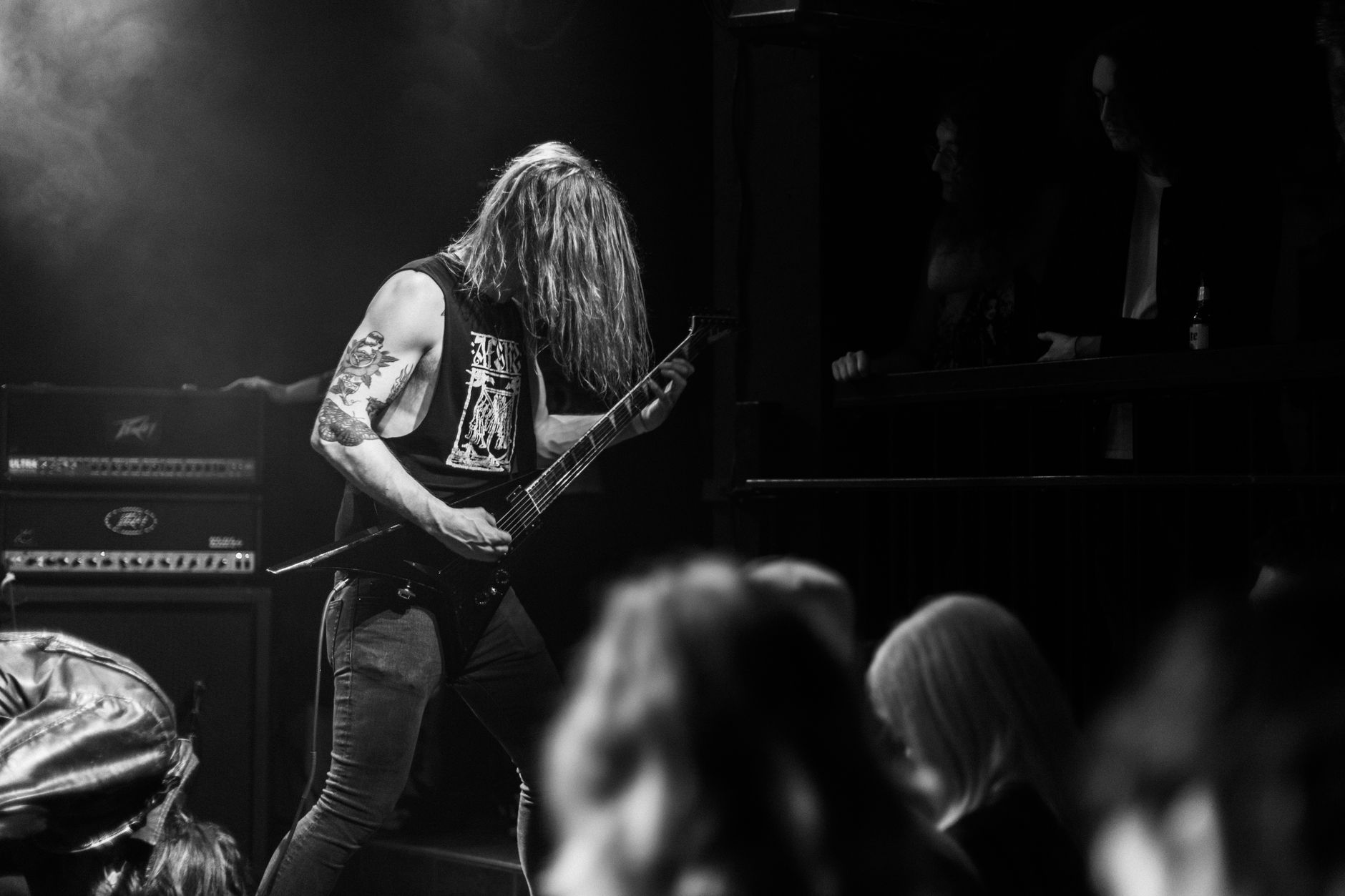 Metal band performing on stage, capturing the tension behind metal musicians performance anxiety uk